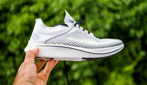 Nike Zoom Fly SP Fast runner shoes in man hands — Stock Photo, Image