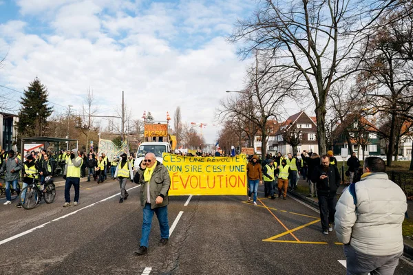Placard with inscription Macron Demission at yellow vests protest — Stock Photo, Image