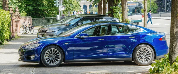 Tesla Model 90D electric supercar parked in city – Stock Editorial Photo ©