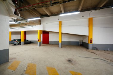 Wide angle view of French underground parking clipart