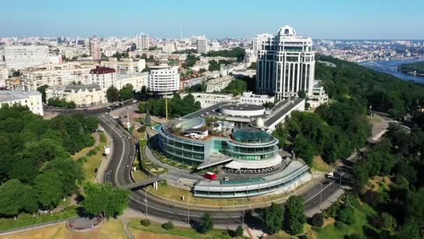 Drone aerial of modern buildings in Kiev overlooking a lake, Ukraine — Stock Video