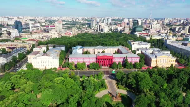 Drone aerial of modern buildings in Kiev overlooking a lake, Ukraine — Stock Video