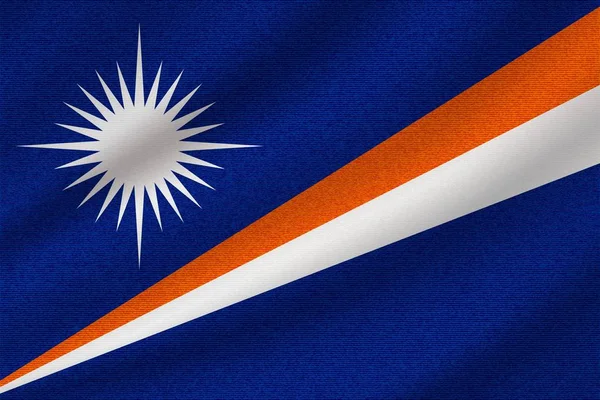 Marshall Adaları 'nın ulusal bayrağı dalgalı pamuk kumaş üzerinde. Gerçekçi vektör illüstrasyonu.