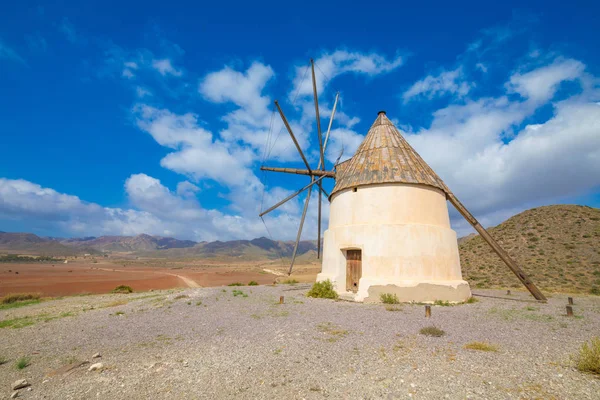 ancient wind mill on the hill of Genoveses Beach in Gata Cape in Nijar (Almeria, Andalusia, Spain, Europe). Built in the Nineteenth century