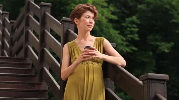 Woman Drinks Coffee Outdoor Sunlight Light Enjoying Her Morning Coffee — Stock Video