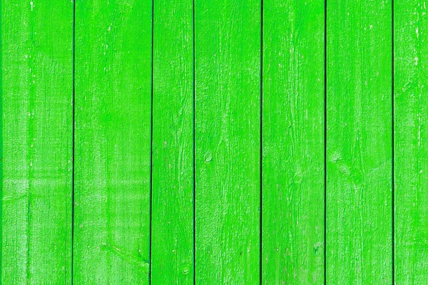 Bright vintage green background. Paint on wood