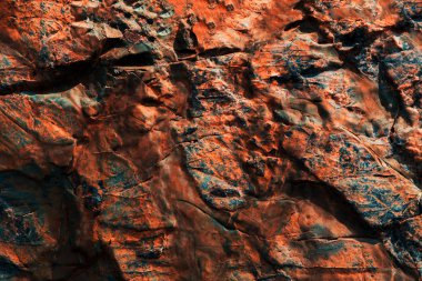 Taşlar ve kayalar güzel doku. Metniniz için turuncu arka plan