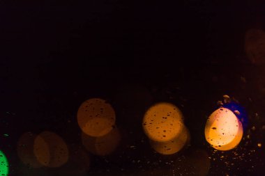 Dairesel bokeh arka plan Noel ışık soyut. Siyah doku, kopya alanı için soyutlama