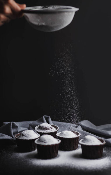 Sweet pastries, muffins and cupcakes on the table