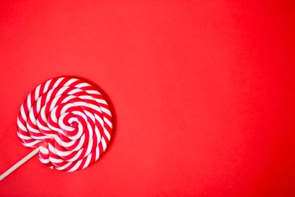 Red and white spiral lollipop