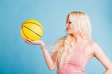 Young woman with a basket ball.