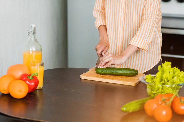 stock image Young woman cooking in the kitchen