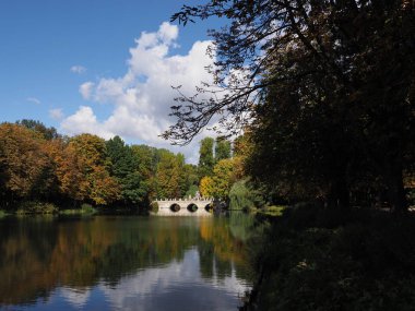 Scenic part of bridge in baths park landscapes in Warsaw, european capital city of Poland with clear blue sky in 2018 warm sunny autumn day on September.