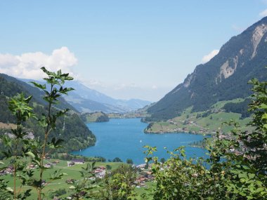 Lake Brienz seen from Brunig Pass in Switzerland with clear blue sky in 2018 warm sunny summer day on August.