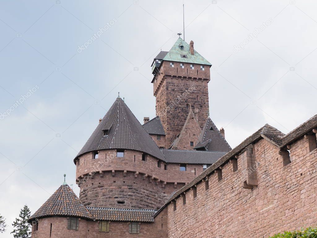 Fortifications of Koenigsbourg castle in european Orschwiller town of Alsace in France with cloudy sky in 2018 warm summer day on August.