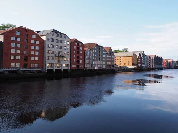 Scenic buildings reflected in water at Nidelva river in european Trondheim city at Trondelag district in Norway — Stock Photo, Image