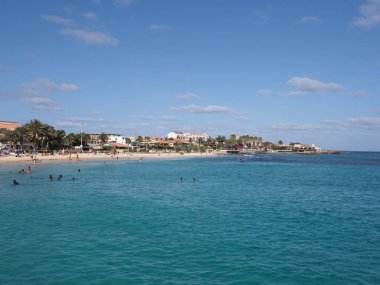 Seaside at Atlantic Ocean in african Santa Maria town at Sal island in Cape Verde, clear blue sky in 2019 warm sunny spring day on March.