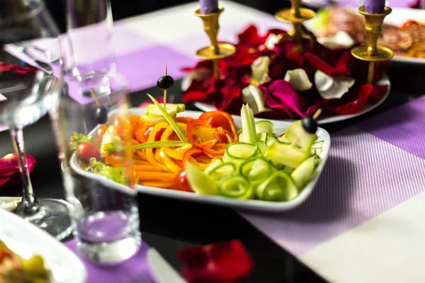 Served holiday table with different tasty dishes — Stock Photo, Image