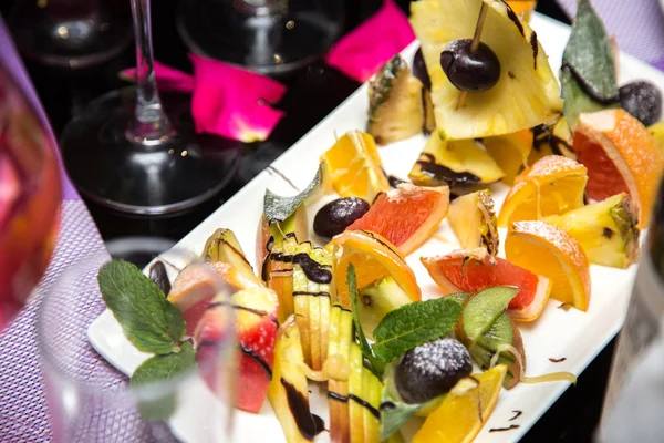 Served holiday table with different tasty dishes — Stock Photo, Image