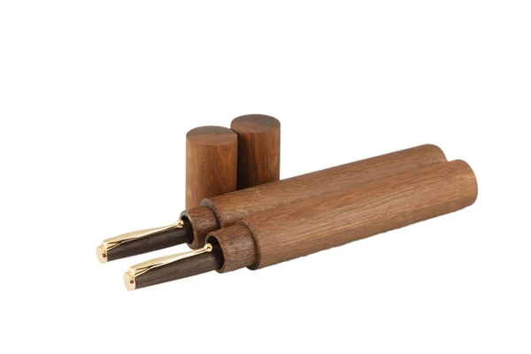 Bolígrafo de madera con un tubo para almacenar sobre un fondo blanco —  Fotos de Stock