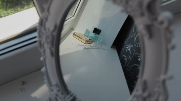 Perfume on a light white window — Stock Video