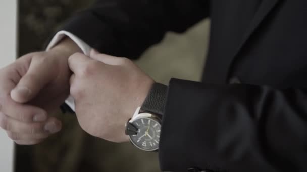 Man Puts On Tie, Watch, Shoe, Jaket. — Stock Video