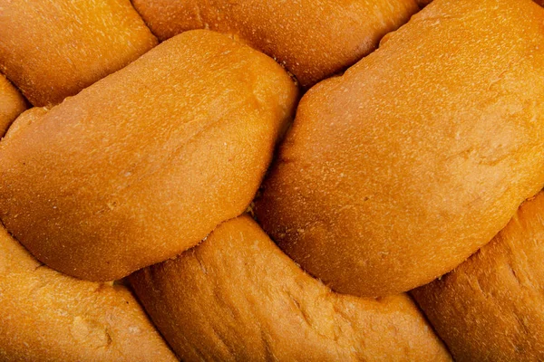 Freshly baked bread on a wooden background. — Stock Photo, Image