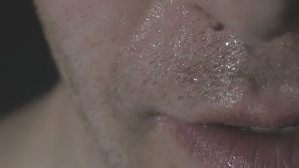 The mans smile.A man with a beard smiling. Close-up. sexy lips — Stock Video