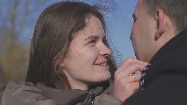 A loving couple walks by the river — Stock Video