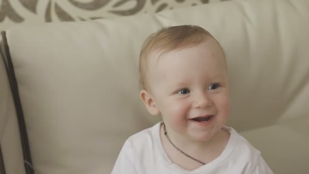 Father and mother are playing with their little child. Family at home — Stock Video