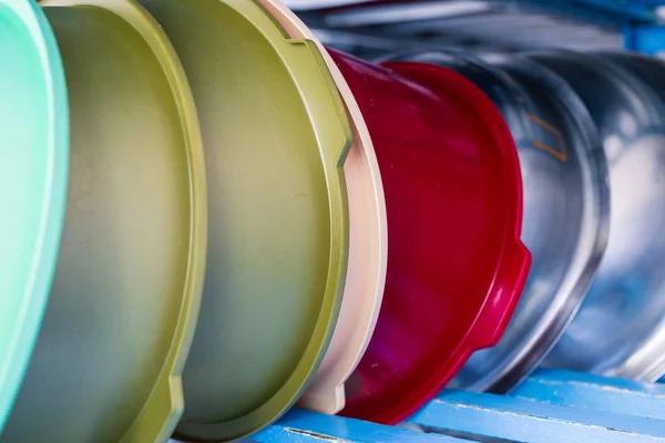 Basins on the rack for drying utensils in production. — Stock Photo, Image