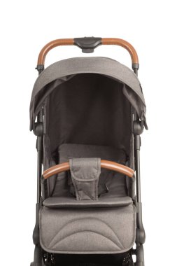 Beyaz bir arka planda bir bebek arabası yakın çekim ayrıntılarını bir bebek arabası.