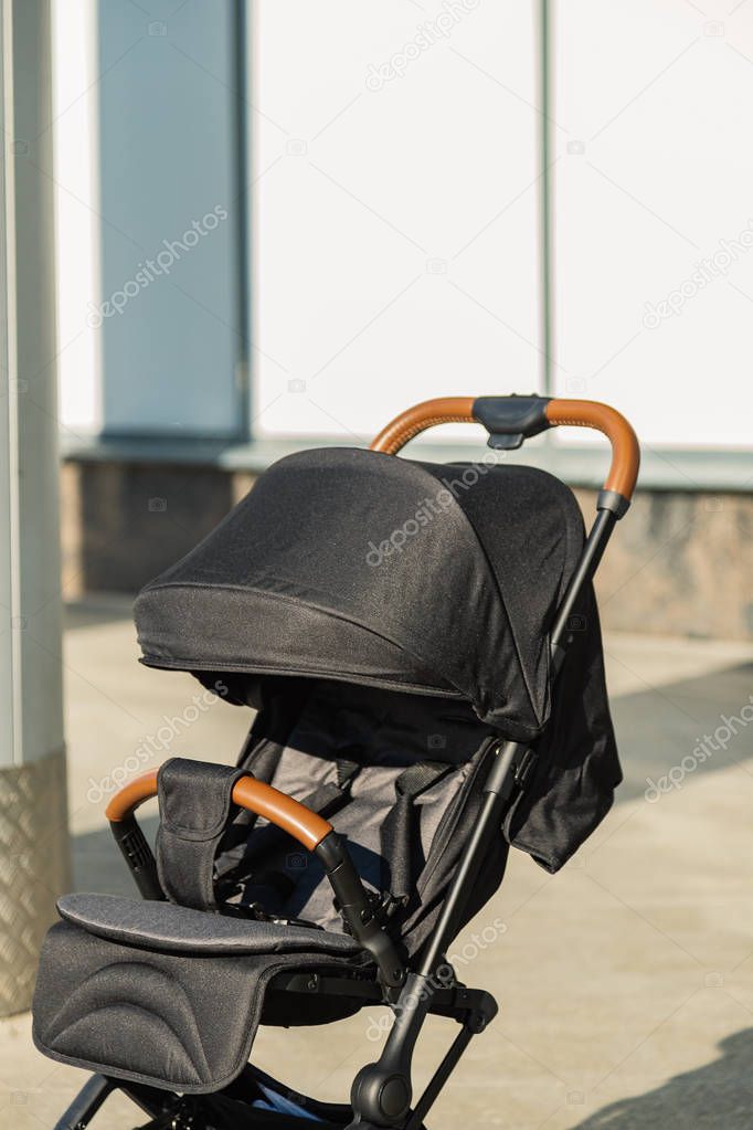 Baby stroller standing on the street, new design.