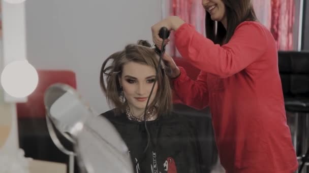 Professional Hairdresser Does A Girls Hairstyle For A Photo Shoot