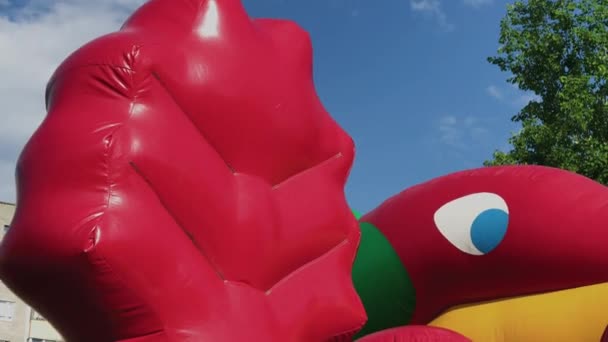 Detail of an inflatable playground on a sunny day. — Stock Video