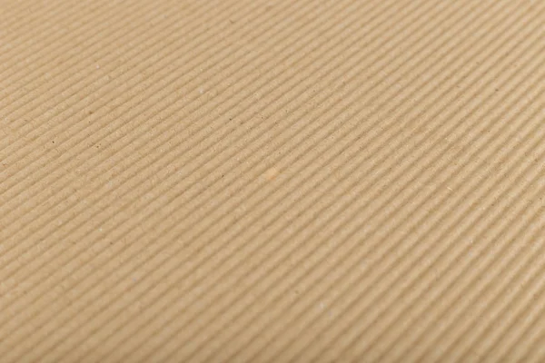 瓦楞纸板，用于包装。带米色波浪形线条的背景水平线 — 图库照片