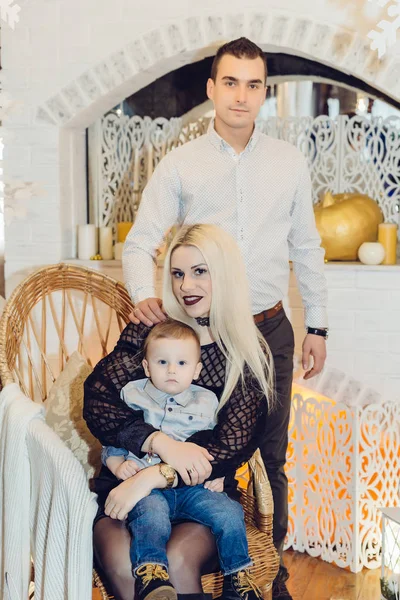 New Year decorations near the fireplace, family — Stock Photo, Image