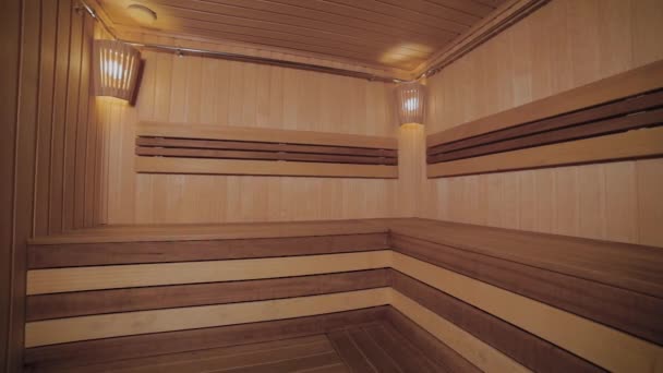 Interior of the sauna room in the spa. — Stock Video