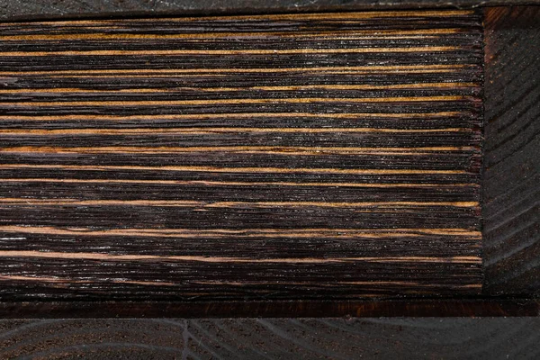 Деревянный фон и текстура с различными породами — стоковое фото