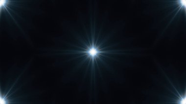 Siyah arka planda ışınlar saçan güzel mercekler..