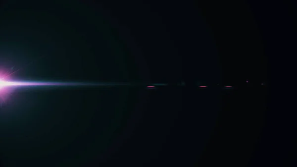 Anamorphic lens flare from a photo camera lens. Anamorphic background. — Stock Photo, Image