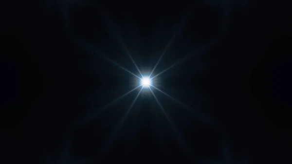 Brilho de lente bonita com raios em um fundo preto . — Fotografia de Stock