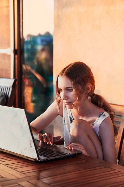 Woman working at home, using portable computer — Stock Photo, Image