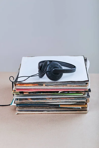 Stack of many black vinyl records