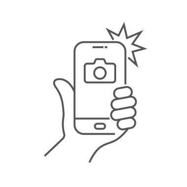 El smartphone tutun ve flash ile fotoğraflandı. Smartphone cep telefonu ile fotoğraf. Düzenlenebilir kontur