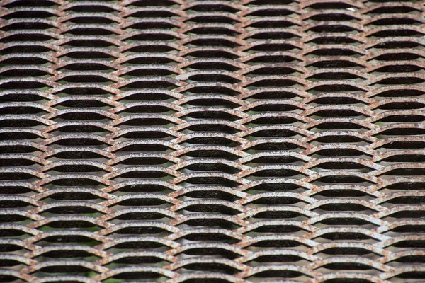 Grungy passerella metallica industriale metallo resistente agli agenti atmosferici griglia geometrica w — Foto Stock