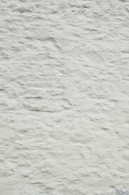 Kaba ve grung badanalı eski taş duvar arka plan