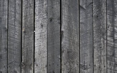 Eski gri ahşap Komiteler closeup duvar kağıdı zemin üzerinde soyulması dökülüyor siyah boya