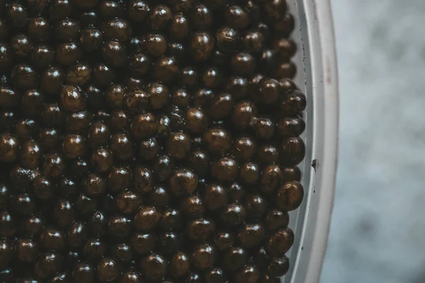 Sturgeon black caviar in can on white background — Stock Image Sturgeon black caviar in can on white background Royalty Free Stock Photos
