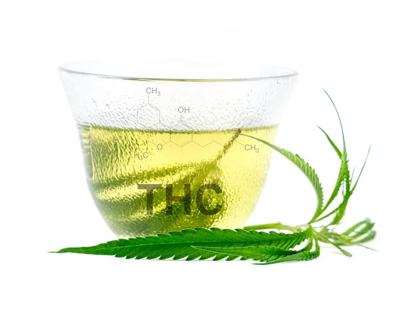 Marijuana herbal tea with cbd and thc symbol — Stock Photo, Image